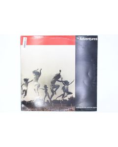 THE ADVENTURES TRADING SECRETS WITH THE MOON VINYL RECORD LP 60871-1 MX304682